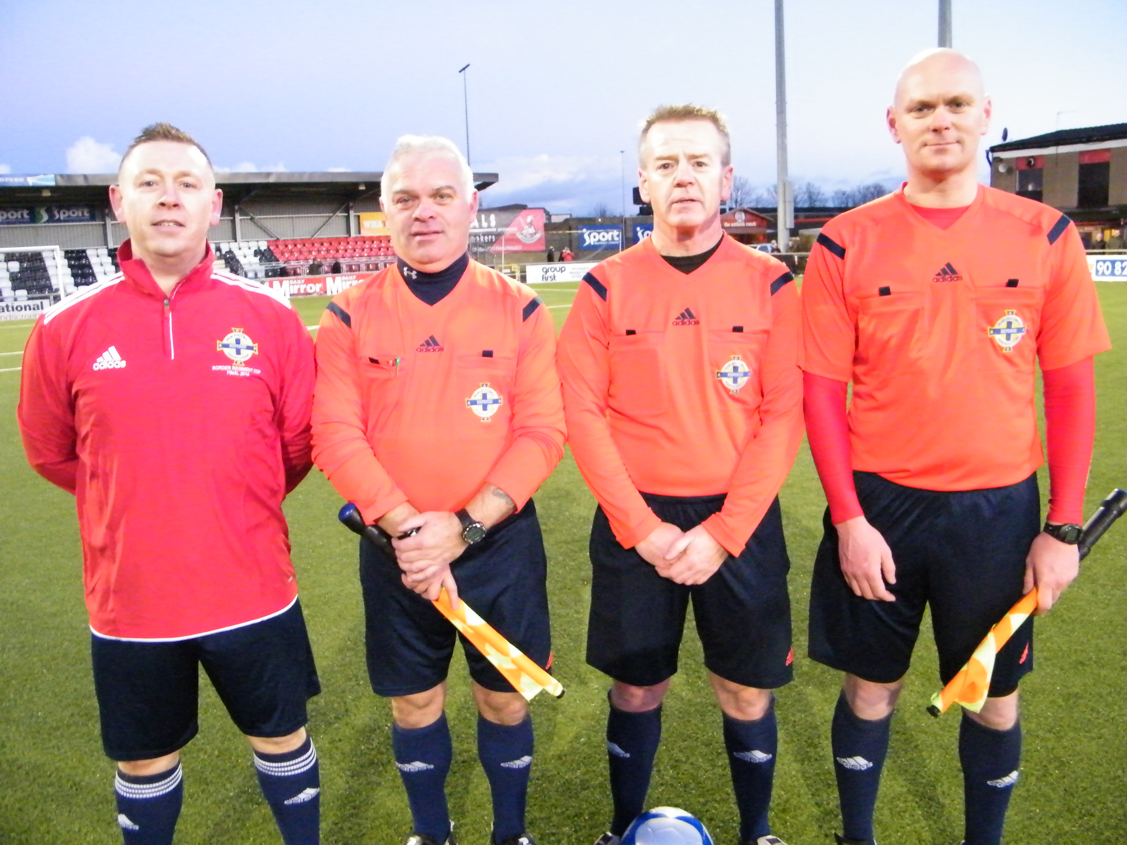 Match officials Referee Trevor Moutray with his assistants Iain Banks,Tony Clarke and Stephen McDonald